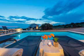Sunset mood modern ap with a pool for 6